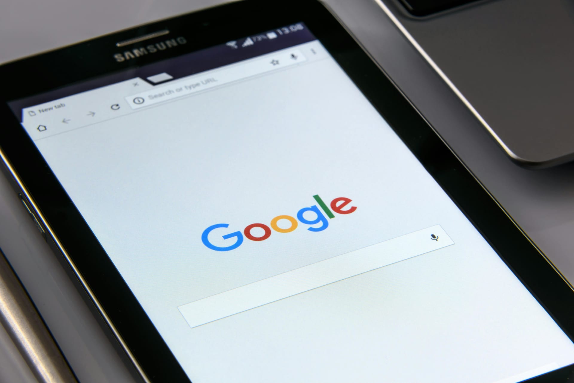 Google search engine webpage on a Samsung phone browser.